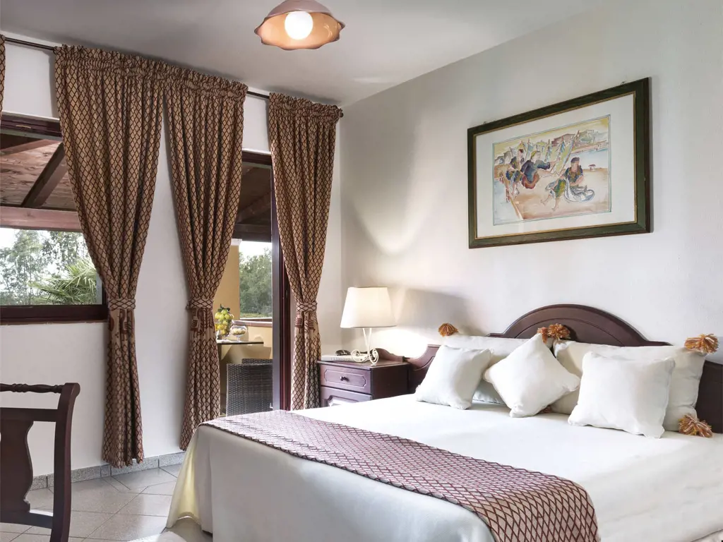 I Giardini di Cala Ginepro 17 giardini-di-cala-ginepro-camera-family-08